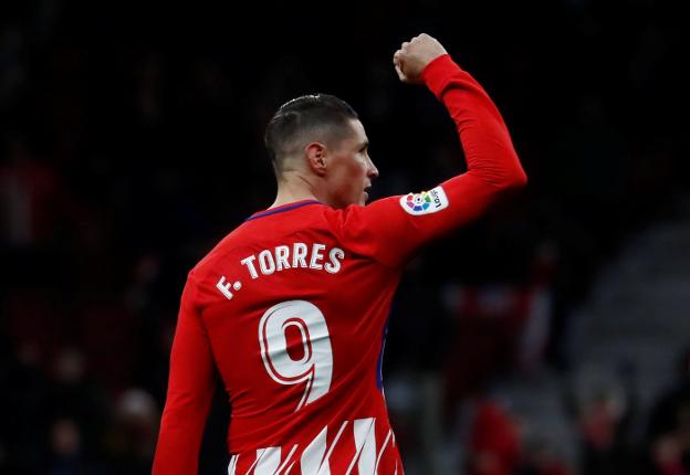 Fernando Torres celebra el gol que le dio el triunfo al Atlético de Madrid. :: reuters/